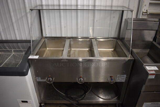 2014 Duke Model EP303 M Stainless Steel Commercial Floor Style Electric Powered 3 Bay Steam Table w/ Sneeze Guard and Under Shelf on Commercial Casters. 208 Volts, 1 Phase. 44.5x23x51.5