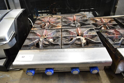 Stainless Steel Commercial Countertop Natural Gas Powered 4 Burner Range. 