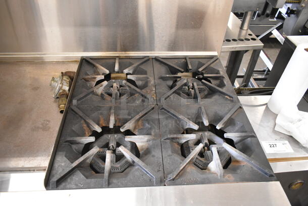 Migali C-RO4-24GL-NG Stainless Steel Commercial Natural Gas Powered 4 Burner Range w/ Flat Top Griddle, 2 Ovens, Over Shelf and Back Splash on Commercial Casters.  - Image 4 of 12
