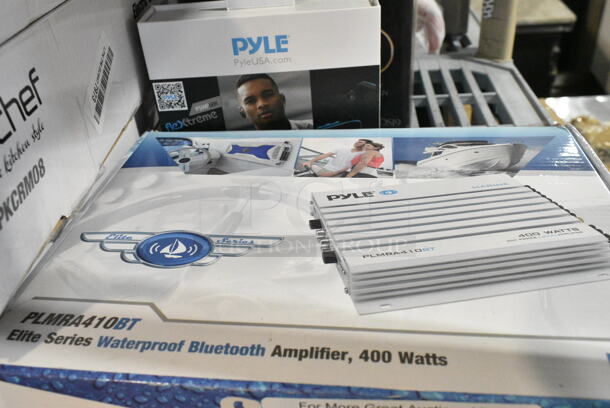 10 IN ORIGINAL BOX! Items Including  Pyle PLMRA410BT Elite Series Waterproof 400-watt Marine Class Ab Amp, Pyle PSWP6BK MP3 Player, NutriChef NCGDS19 Home Bar Whiskey Decanter, NutriChef Electric Crepe Maker, 2 Pyle PDA8BUWM Wireless Microphone Power Amplifier. 10 Times Your Bid!  - Image 2 of 8