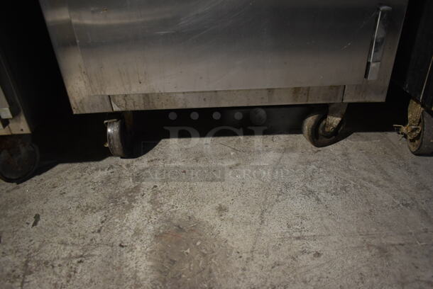 Traulsen RHT 1-32WUT Stainless Steel Commercial 2 Half Size Door Reach In Cooler w/ Racks on Commercial Casters. 115 Volts, 1 Phase. Tested and Powers On But Does Not Get Cold - Image 4 of 7