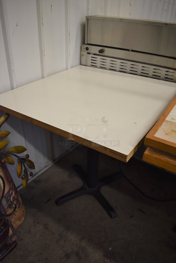 2 Dining Height Table on Black Metal Table Base. Stock Picture - Cosmetic Condition May Vary. 30x30x29.5. 2 Times Your Bid!