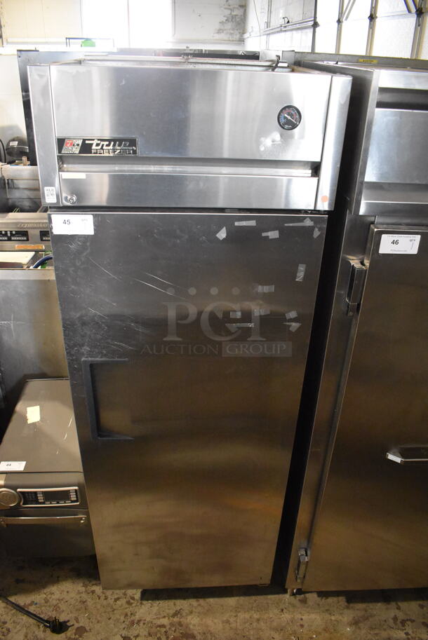 2011 True TG1F-1S Commercial Stainless Steel One Section Reach In Freezer With Polycoated Racks on Commercial Casters. 115V/1 Phase. Tested And Working!