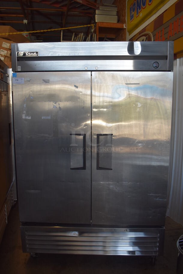 2013 True T-49F ENERGY STAR Stainless Steel Commercial 2 Door Reach In Freezer w/ Poly Coated Racks on Commercial Casters. 115 Volts, 1 Phase. Tested and Working!