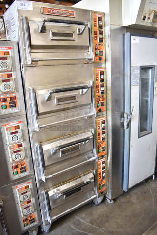 4 Stainless Steel Commercial Electric Powered Single Deck Bakery / Pizza Ovens on Commercial Casters. 4 Times Your Bid!