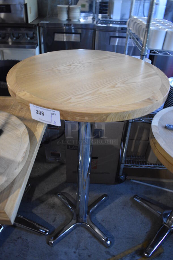 Wood Pattern Round Bar Height Table on Metal Table Base. Stock Picture - Cosmetic Condition May Vary. 24x24x41.5