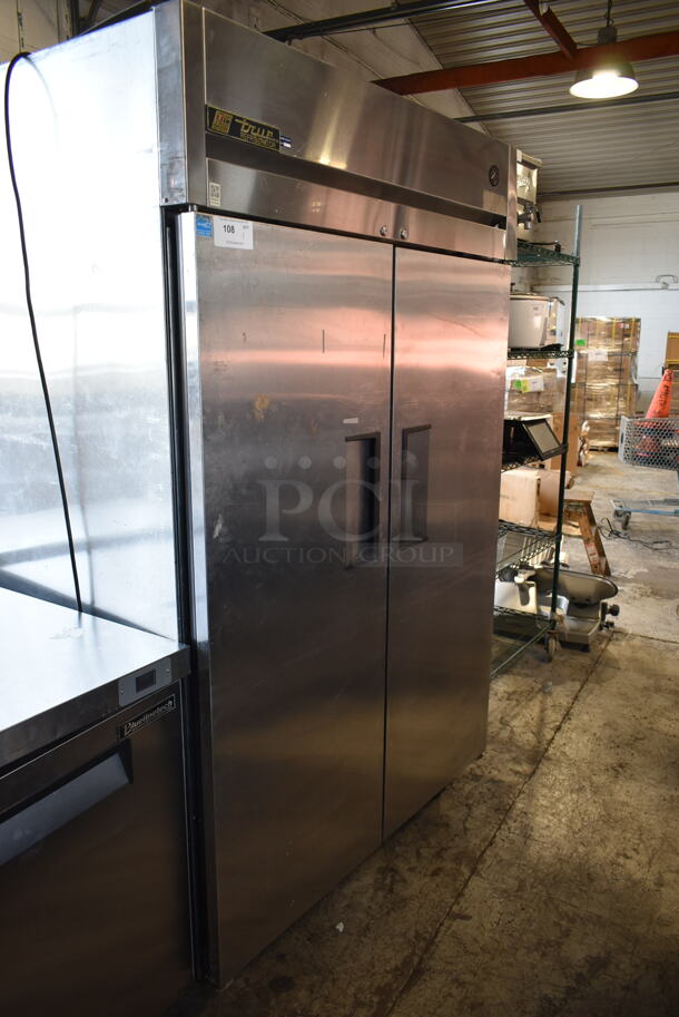 2012 True TG2R-2S ENERGY STAR Stainless Steel Commercial 2 Door Reach In Cooler w/ Poly Coated Racks on Commercial Casters. 115 Volts, 1 Phase. Tested and Working! - Image 1 of 7
