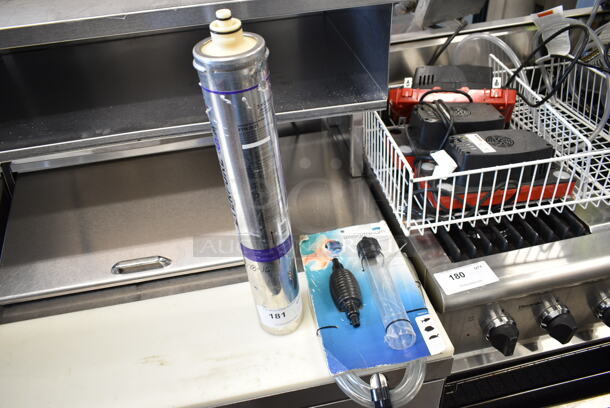 ALL ONE MONEY! Lot of 2 Items Including Everpure EV9618-21 Water Filter Cartridge and Imagitarium Gravel Vacuum - Image 1 of 5