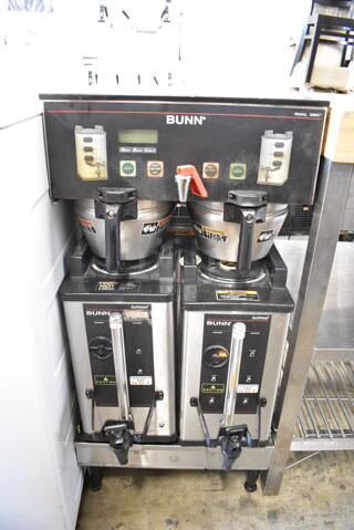 2015 Bunn DUAL SH DBC Stainless Steel Commercial Dual Coffee Machine w/ Hot Water Dispenser, 2 Satellite Servers and 2 Metal Brew Baskets. 120/208-240 Volts, 1 Phase. 