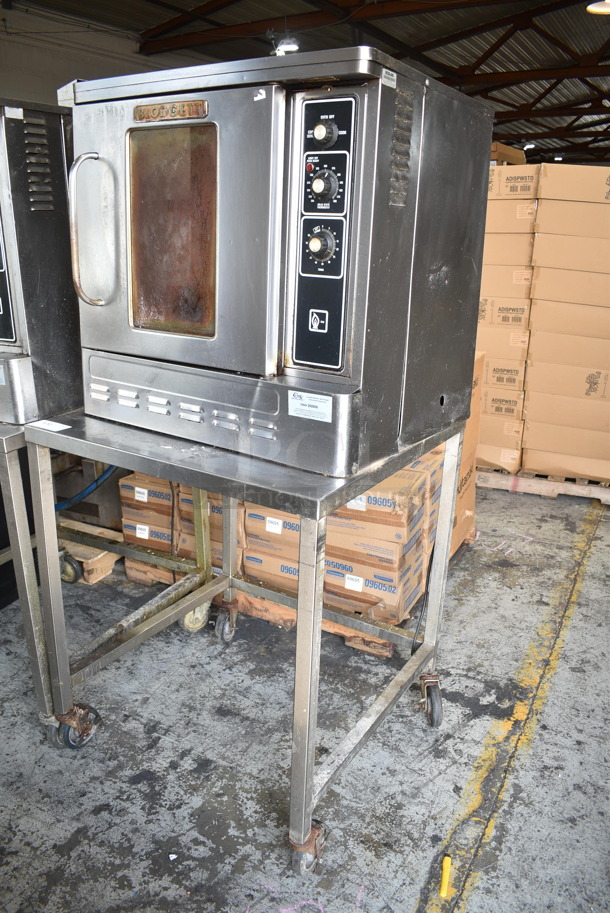 Blodgett Stainless Steel Commercial Natural Gas Powered Half Size Convection Oven w/ View Through Door, Metal Oven Racks, Thermostatic Controls and Equipment Stand on Commercial Casters.  - Image 2 of 6