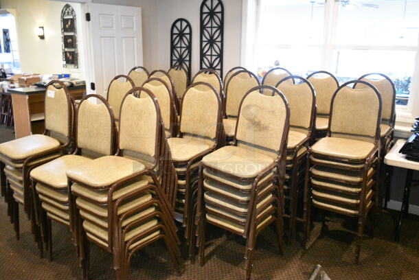 110 Brown Metal Stackable Banquet Chair. 110 Times Your Bid! BUYER MUST REMOVE: Bring Tools and Manpower Needed To Remove This Item. (secondary dining room)  - Image 4 of 4