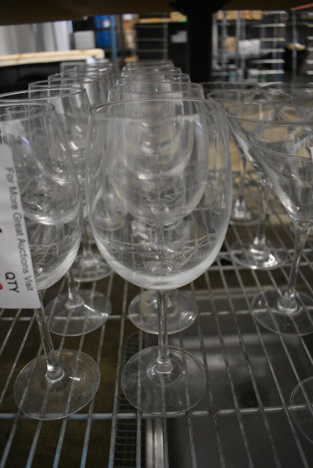 12 Wine Glasses. 3.5x3.5x9. 12 Times Your Bid!