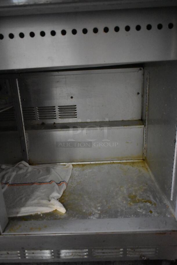 Beverage Air SP48-18M Stainless Steel Commercial Sandwich Salad Prep Table Bain Marie Mega Top on Commercial Casters. 115 Volts, 1 Phase. Tested and Powers On But Does Not Get Cold - Image 4 of 6
