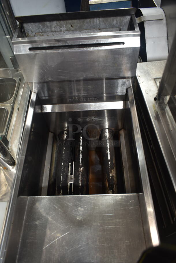 American Range Stainless Steel Commercial Floor Style Natural Gas Powered Deep Fat Fryer w/ 2 Metal Fry Baskets.  - Image 2 of 5