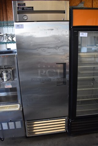 True T-23 Stainless Steel Commercial Single Door Reach In Cooler on Commercial Casters. 115 Volts, 1 Phase. 27x30x82. Tested and Working!