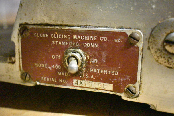 Globe 400 Stainless Steel Commercial Countertop Meat Slicer. 115 Volts, 1 Phase. This Unit Was In Working Condition When the Restaurant Closed. (basement) - Image 9 of 9
