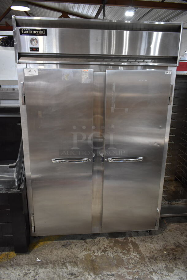 Continental 2R Stainless Steel Commercial 2 Door Reach In Cooler w/ Poly Coated Racks on Commercial Casters. 115 Volts, 1 Phase. - Item #1112751