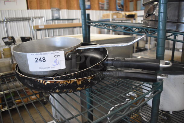 3 Metal Pans; 2 Skillets and 1 Sauce Pan. Includes 17x9x5, 20x13x2. 3 Times Your Bid!