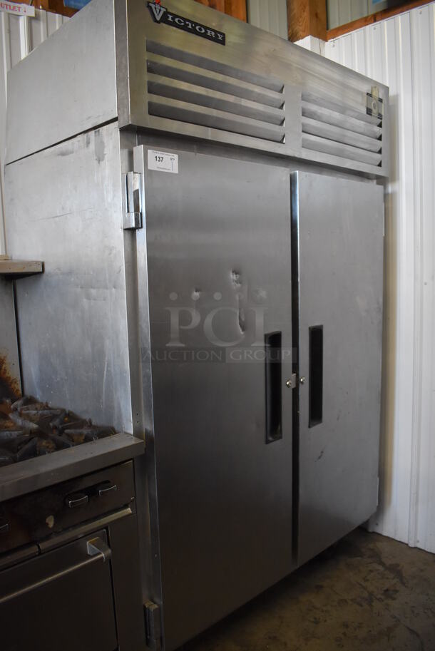 Victory RAA-2D-S9 Stainless Steel Commercial 2 Door Reach In Cooler on Commercial Casters. 115 Volts, 1 Phase. 52x33x84. Tested and Powers On But Temps at 51 Degrees