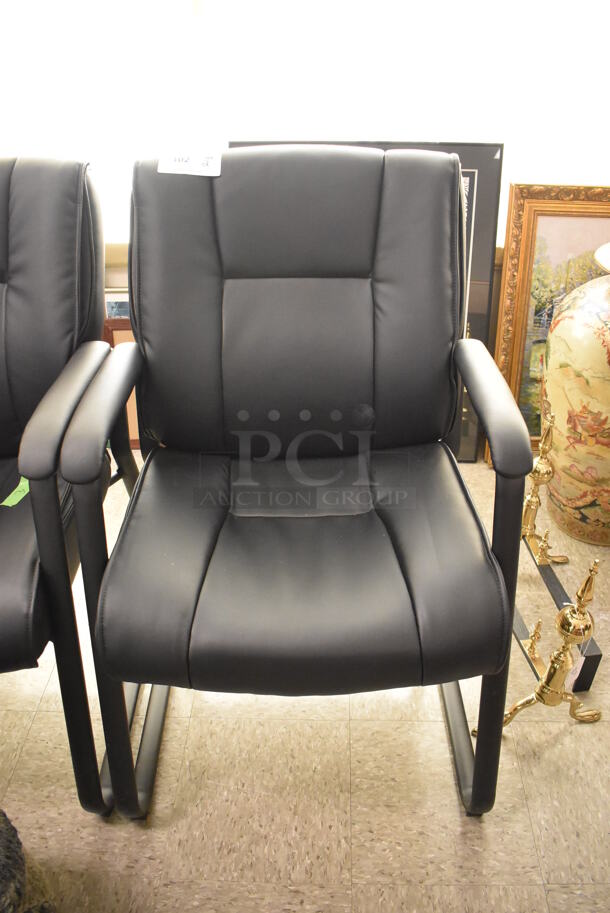 2 Black Office Chairs w/ Arm Rests. 2 Times Your Bid!