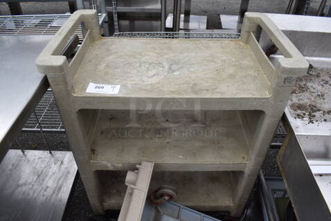 Tan Poly 3 Tier Cart w/ Push Handles on Commercial Casters. 31x17x37