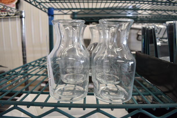6 Glass Bottles. 2.5x2.5x5. 6 Times Your Bid!