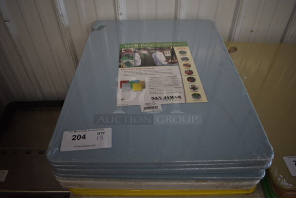 12 BRAND NEW! San Jamar Cutting Boards; 5 Blue, 4 White and 3 Yellow. 18x24x1. 12 Times Your Bid!