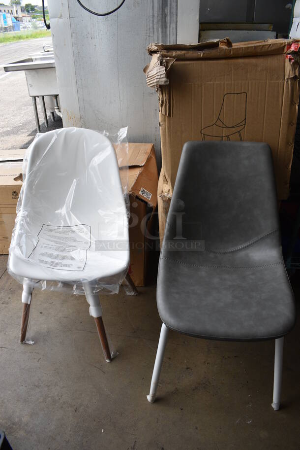 6 BRAND NEW IN BOX! Chairs; 4 Gray Leather Style Chairs on Meta Legs and 2 White on Wooden Legs. 18x15x34, 18x18x33. 6 Times Your Bid!