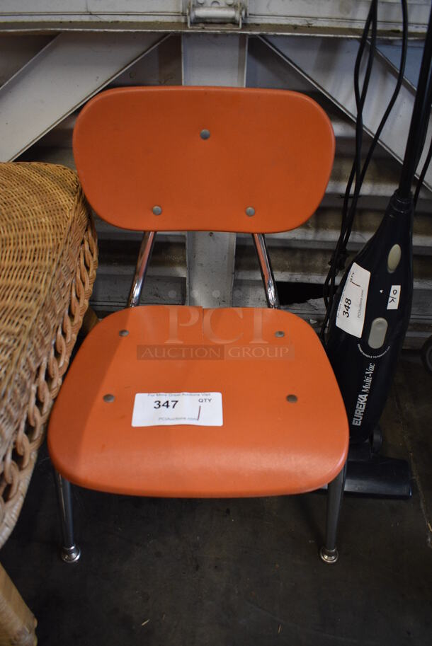 Orange Poly and Metal Childrens Chair. 17x15x24