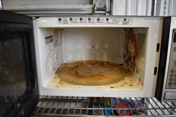 General Electric Model JES1142SF001 Metal Countertop Microwave Oven w/ Plate. 21x15x12 - Image 4 of 5