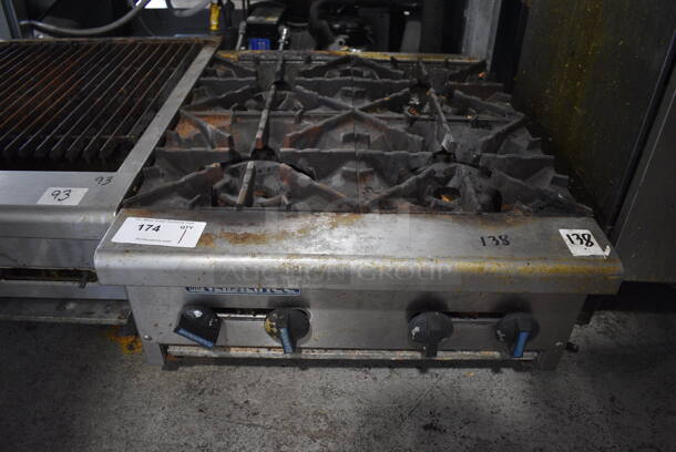 Radiance Stainless Steel Commercial Countertop Natural Gas Powered 4 Burner Range. 24x30x12.5
