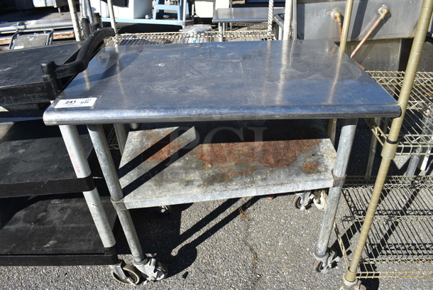 Stainless Steel Table w/ Metal Under Shelf on Commercial Casters. 36x24x35