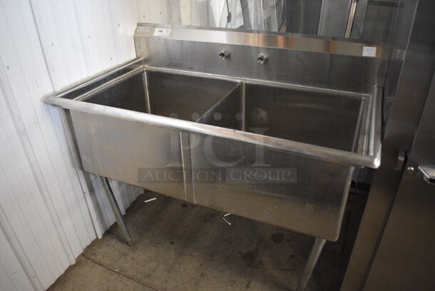 Stainless Steel Commercial 2 Bay Sink. Comes w/ Faucet and Handles. 53x29x46. Bays 24x24x14