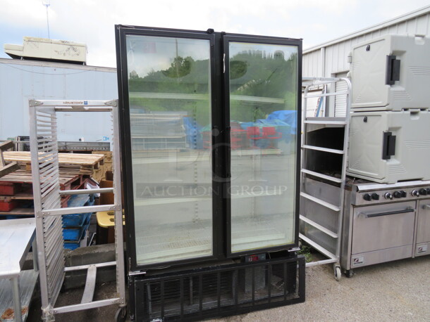 One 2 Door Masterbilt Glass Display Merchandiser Freezer With 8 Racks. 115-208-230 Volt. 1 Phase. Model# BLG-48HD. 52X33X81