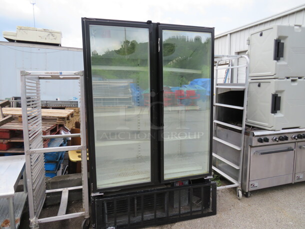 One 2 Door Masterbilt Glass Display Merchandiser Freezer With 8 Racks. 115-208-230 Volt. 1 Phase. Model# BLG-48HD. 52X33X81 - Image 1 of 3