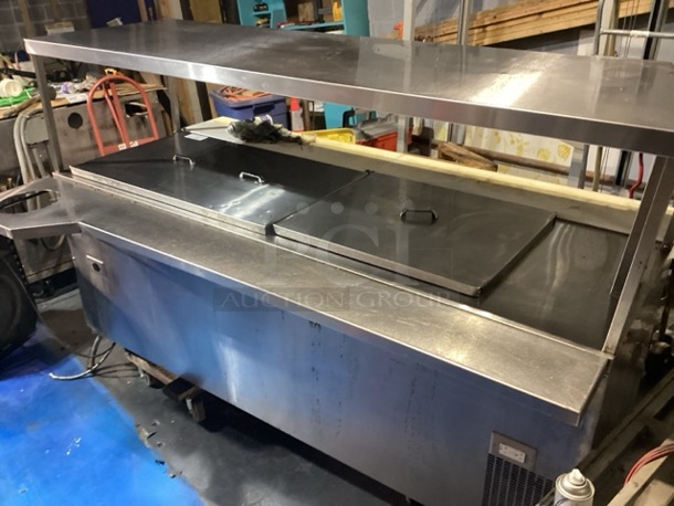 Randell Stainless Steel Dual-Sided Refridgerated Work Island, Multi-Pan Prep Table W/Two -Door and Two Drawers  Refrigerated Storage. Tested And Working. 84 x  46/52 x 58.
 - Image 11 of 11