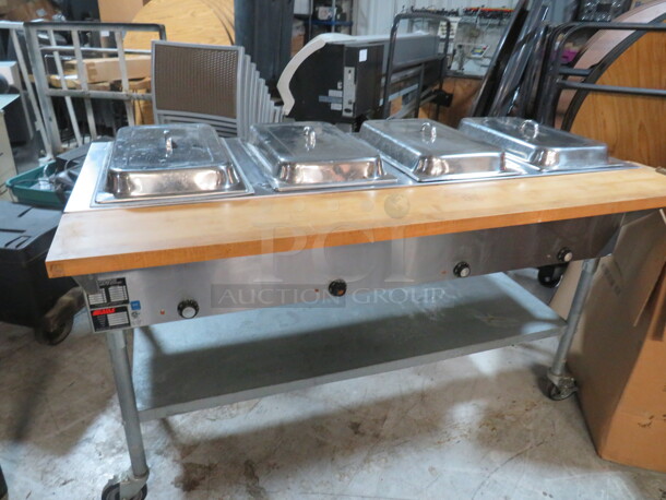 One Eagle 4 Well Steam Table With Under Shelf, Butcher Block Rail, And 4 Lids, On Casters. Model# DHT4-240. 240 Volt. 1 Phase. 3000 Watt. 64X31X38.5 - Image 2 of 3