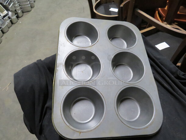 One 6 Hole Commercial Muffin Pan.