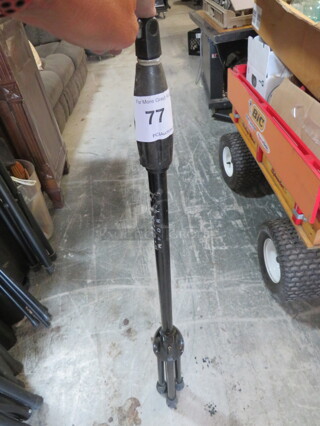 One Tripod Stand.