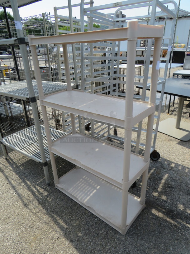 One Poly Shelving System With 4 Shelves. 34X14X57 - Image 1 of 1