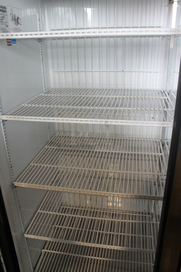 2016 True GDM-72F-HC-LD ENERGY STAR Metal Commercial 3 Door Reach In Freezer Merchandiser w/ Poly Coated Racks. 115/208-230 Volts, 1 Phase.  - Image 3 of 8