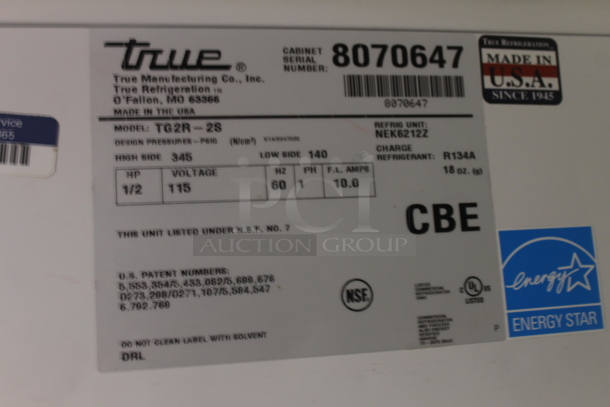 2014 True TG2R-2S ENERGY STAR Stainless Steel Commercial 2 Door Reach In Cooler w/ Poly Coated Racks on Commercial Casters. 115 Volts, 1 Phase. Tested and Working! - Image 5 of 6