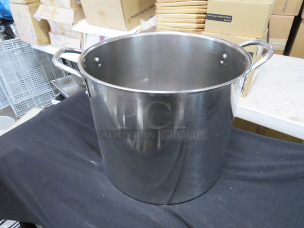One Stainless Steel Stock Pot. 11.5X9.5