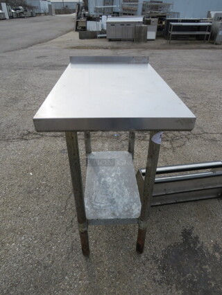 One Stainless Steel Table With Under Shelf. 18X30X36