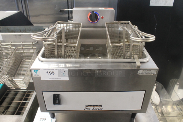 Toastmaster TMPE15 Stainless Steel Commercial Countertop Electric Powered Deep Fat Fryer w/ 2 Metal Fry Baskets. 208/240 Volts, 1 Phase.  - Image 1 of 5