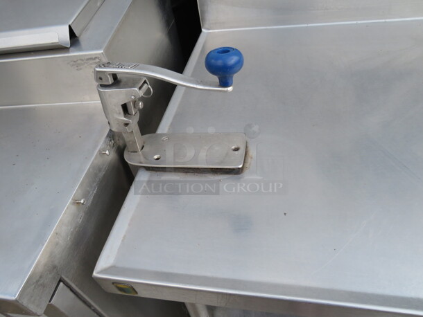 One Stainless Steel Table With 2 Stainless Steel Under Shelves, Back Splash, And 10lb Can Opener, On Casters. 60X32X39 - Image 2 of 2