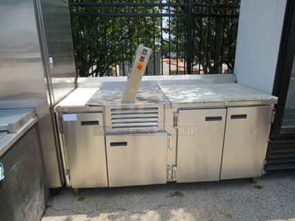 One SS Pasta Work Table With 4 Doors, Cutting Board Top, Back Splash, Under Storage, And A Pama Parse Pasta Cutting Machine. Model# TR/5-S. 230 Volt. 1 Phase. 70X30X51