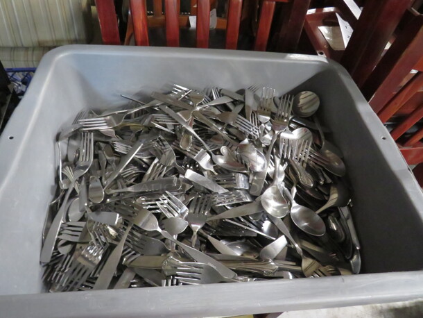 One Bussing Tub Full Of Assorted Flatware.