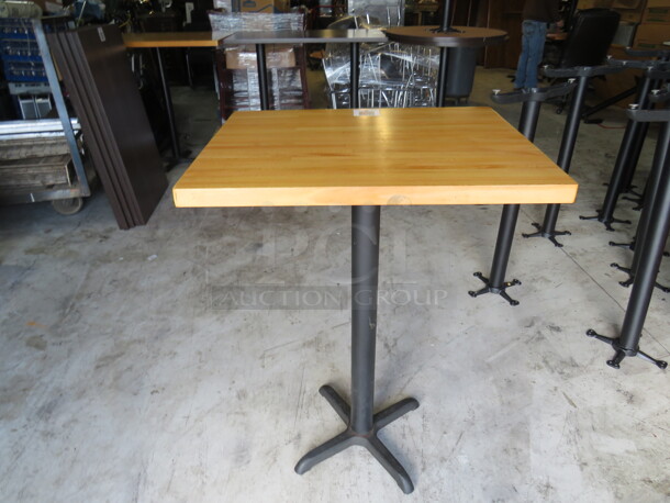 One Solid Wooden Butcher Block Table Top On A Bar Height Pedestal Base. 30X24X42