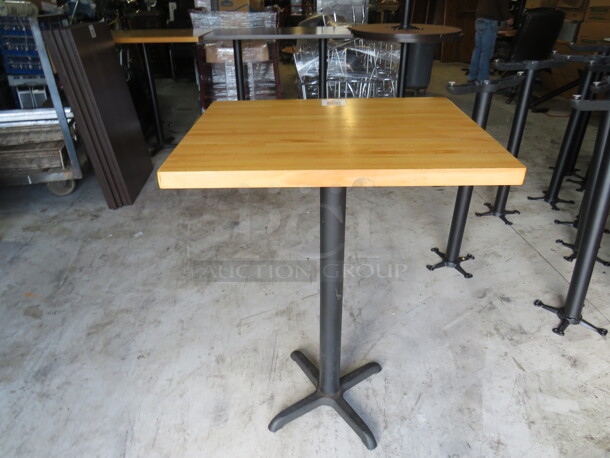 One Solid Wooden Butcher Block Table Top On A Bar Height Pedestal Base. 30X24X42 - Image 1 of 2